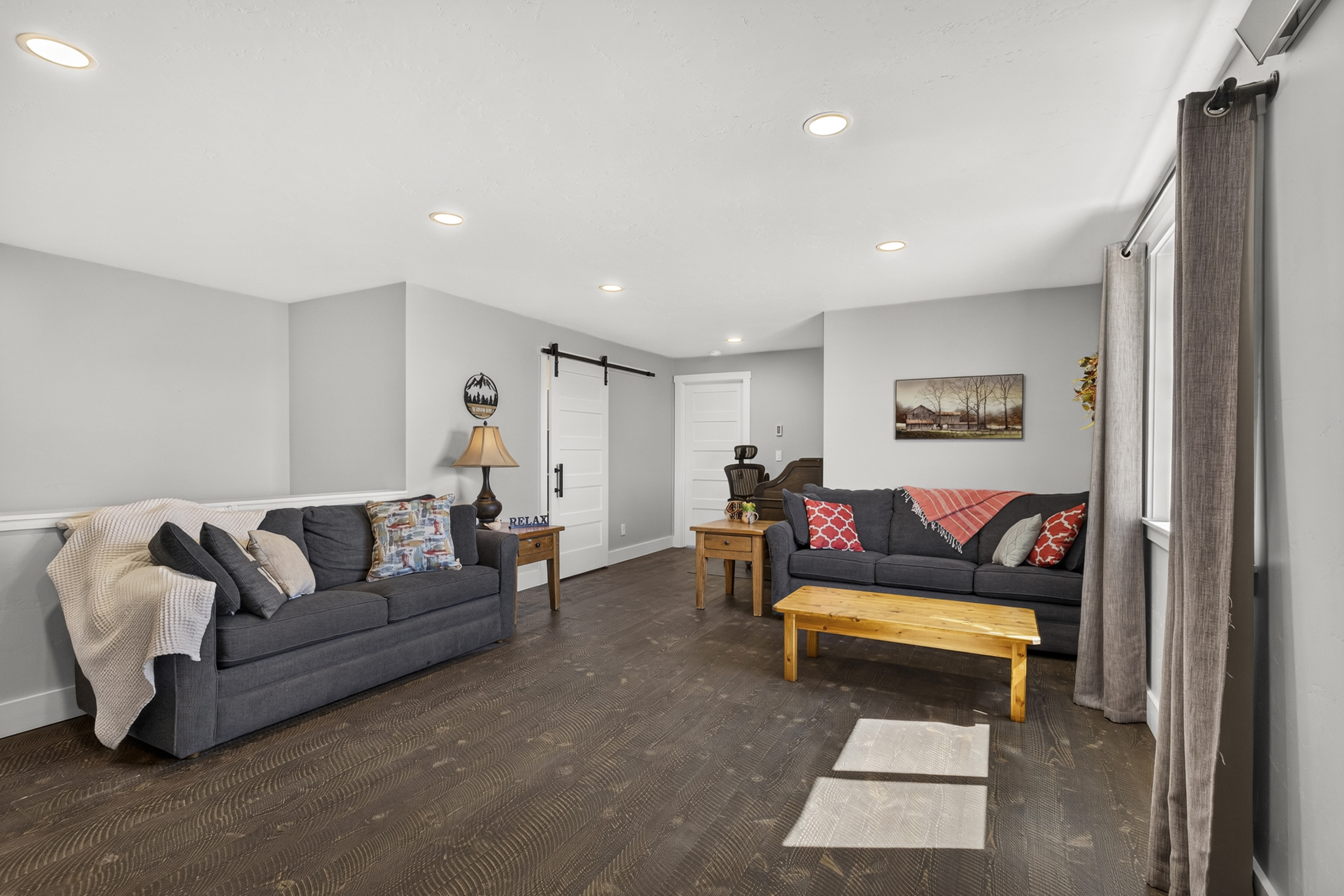 Living room upstairs and two pull out couches.