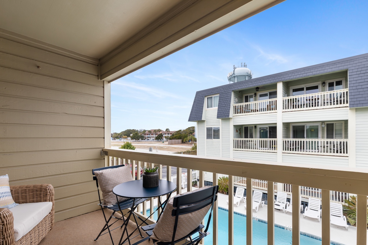 Balcony Overlooking Pool | 211C Oceanside Villas | Isle of Palms SC | IOP Escapes