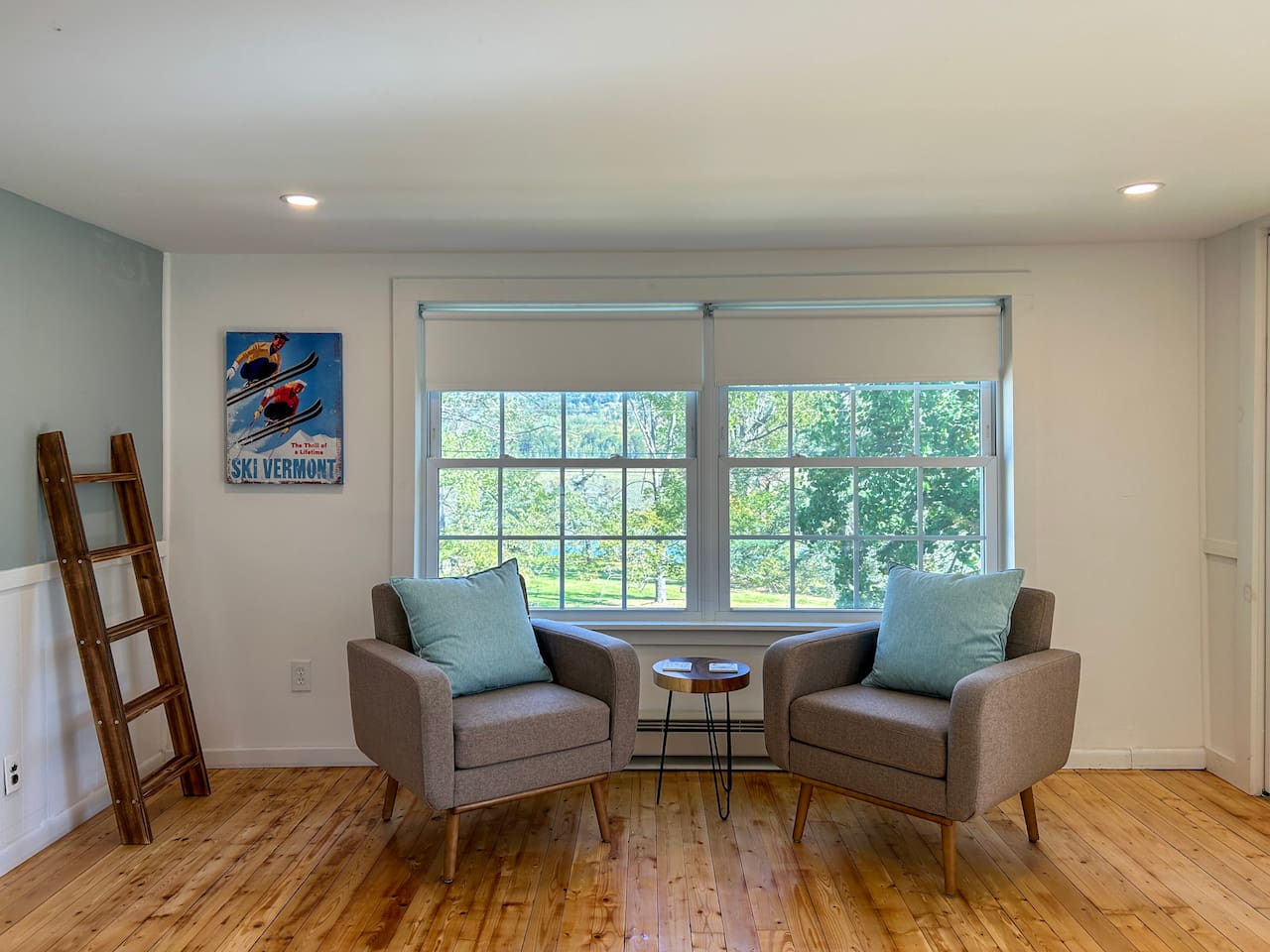 The sitting area in the primary bedroom is a nice spot for a quiet moment with tea or coffee in the morning or an afternoon break with a book