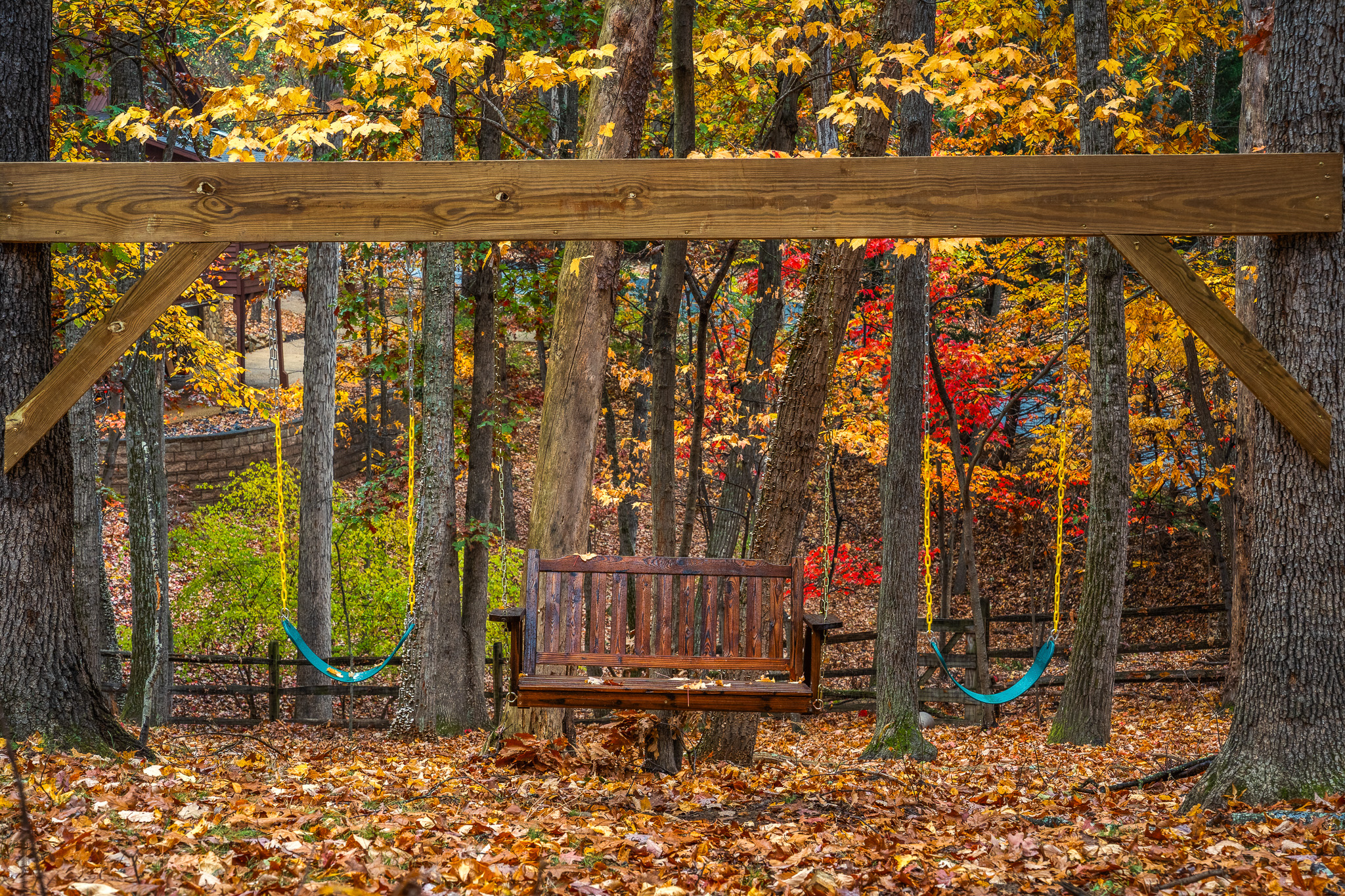 Classic swings plus a bench swing—fun for kids and a peaceful perch for adults