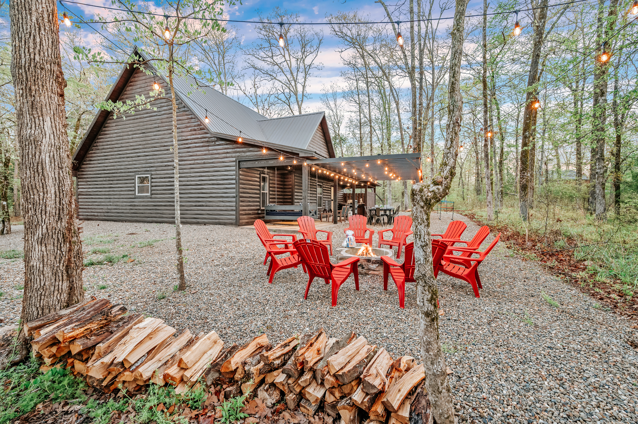Share stories and enjoy the campfire outside our luxurious cabin.