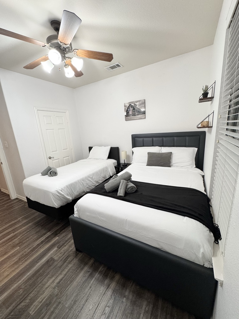 A perfect space for children or extra guests, featuring a full bed and twin bed with soft linens.