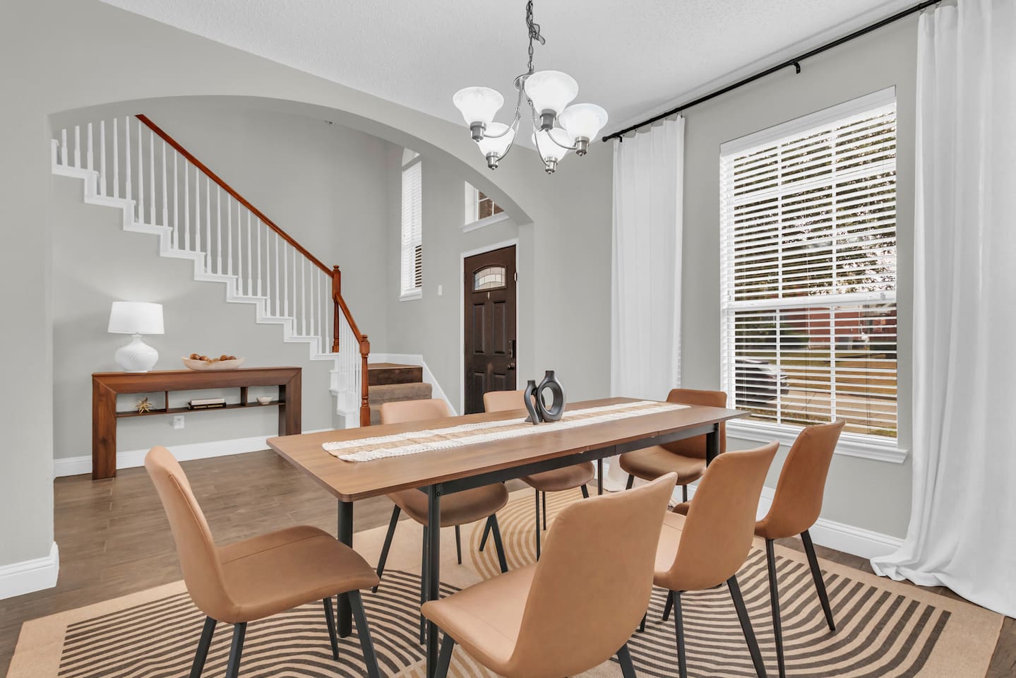 Spacious dining area designed for family dinners, game nights, or working meals with your group.