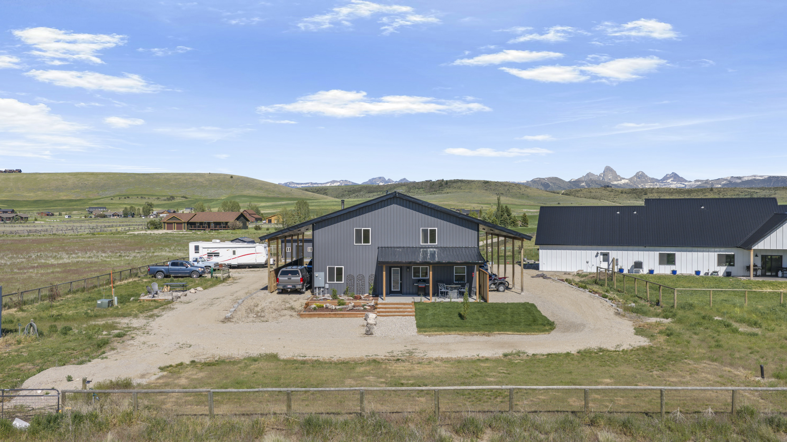 Exterior of the home with amazing view of the Tetons.