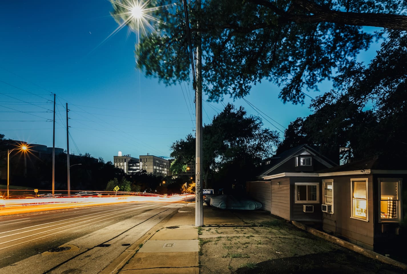 The two houses are right cross the street from UT law school and built on east wood neighbor park woods.