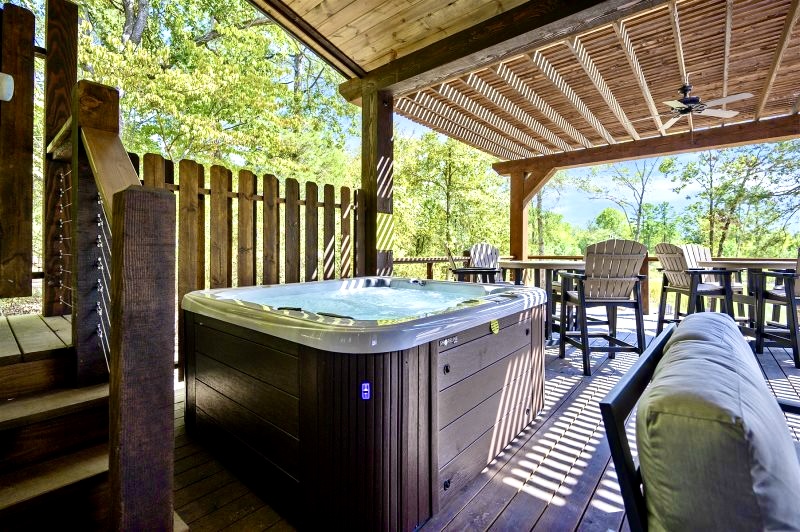 Soak your cares away in the private jetted hot tub overlooking the peaceful pond.