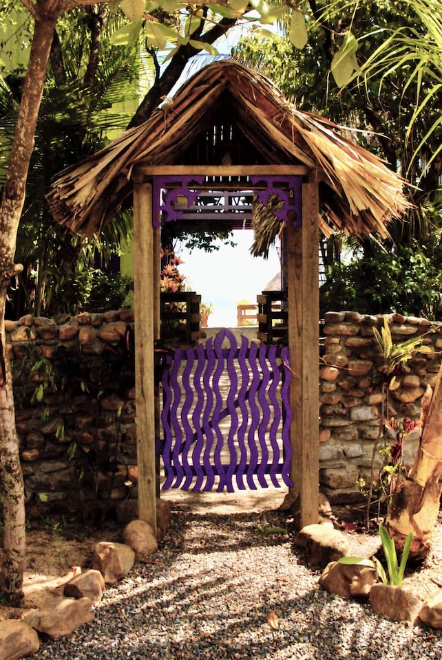 View of Casa Beya's front entrance from the road.