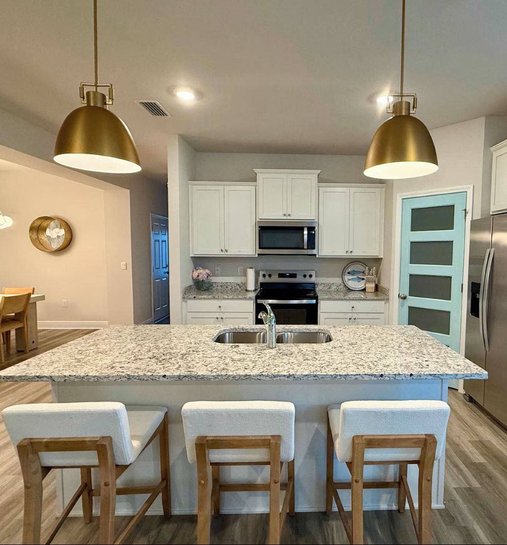 Kitchen island with plush stools