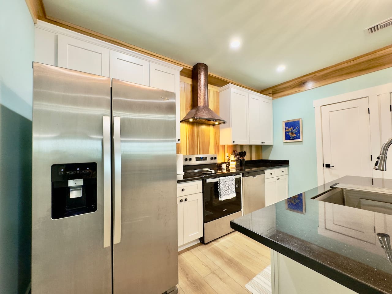 Prepare meals with ease in this bright, modern kitchen.