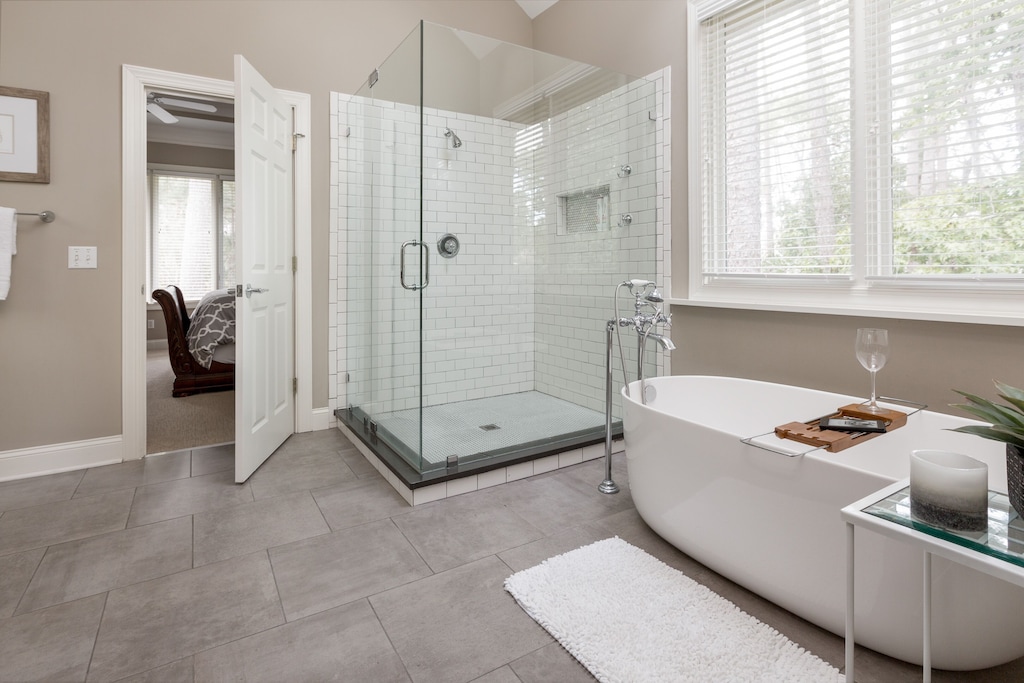 Master bath soaking tub and large shower!  Add a glass of wine and soak away!