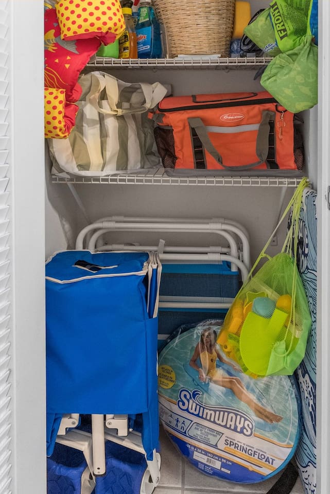 Beach Gear Closet including 2 beach chairs, beach wagon, sand toys, floaties, boogie board, beach bag, and cooler!  