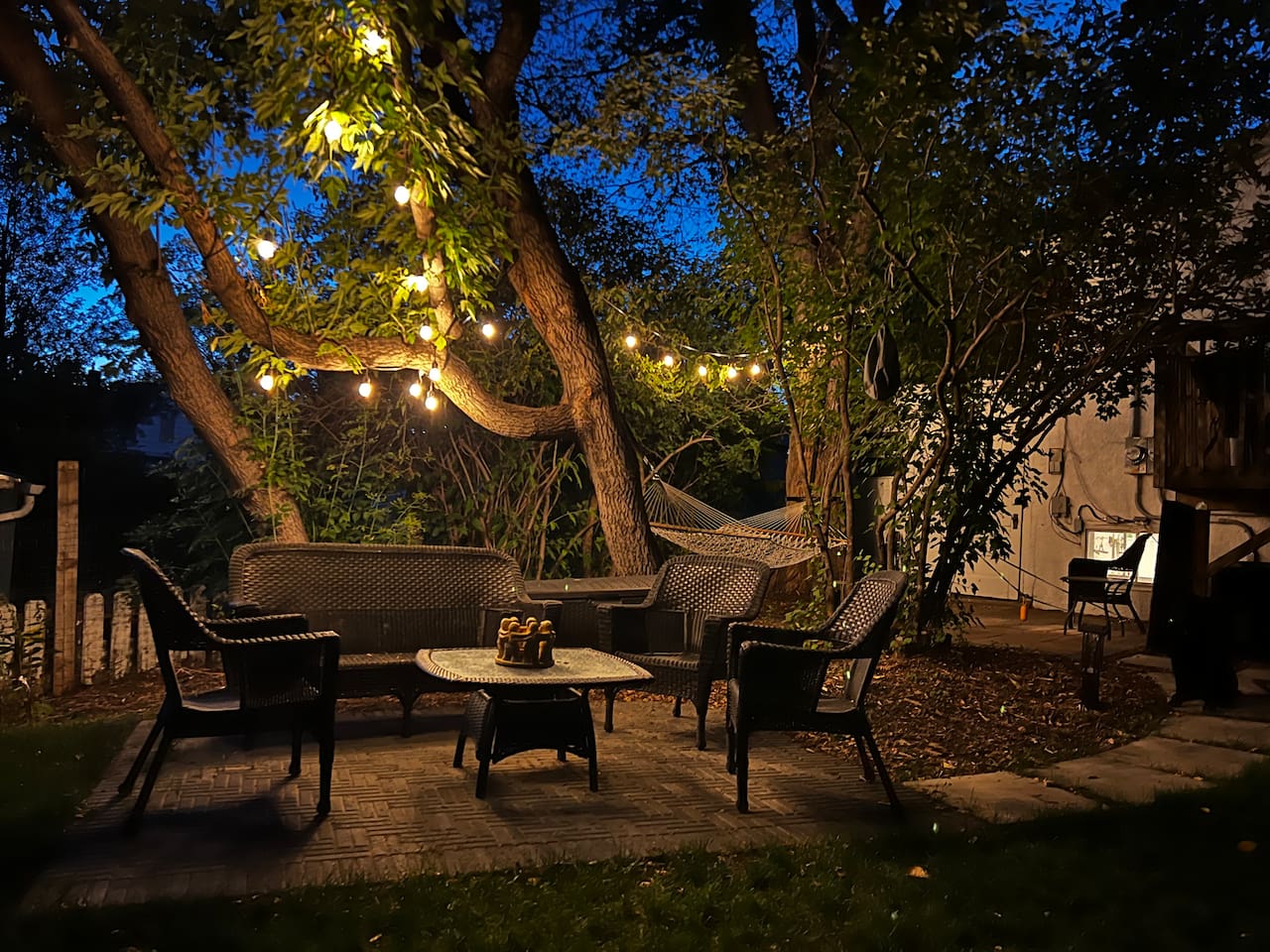Cozy nights under the lights. The perfect spot for evening drinks and conversation.