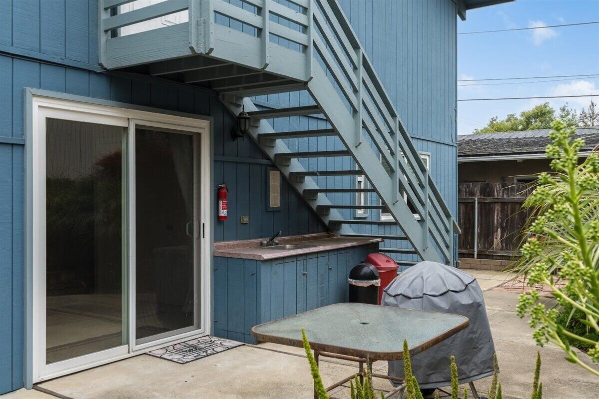 Backyard w/ charcoal BBQ