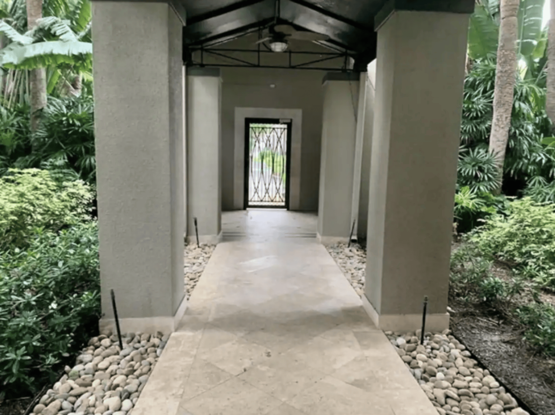 The main hallway inside the community, leading to the elevators behind you.