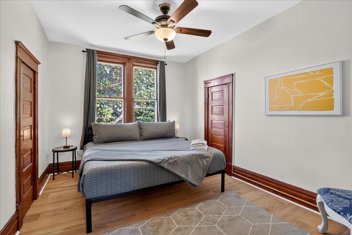 Bright and airy room with a king-size bed. This room also has a 50in smart TV (not pictured).