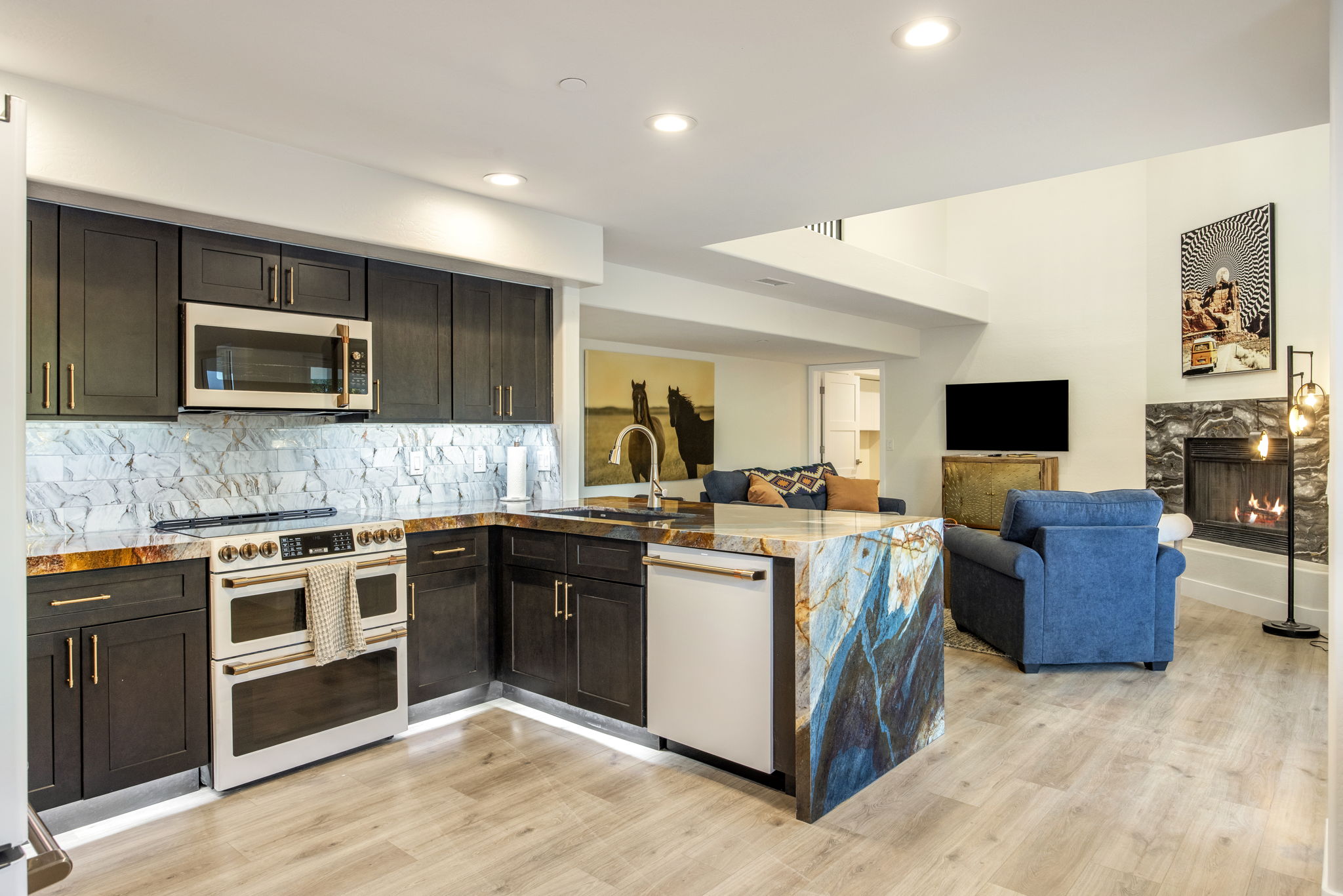 Luxury Café' appliances, exotic Brazilian Quartzite. A real show stopper when entertaining friends and family. Great for family photo pics, designed for a chef or a late night snack warrior.