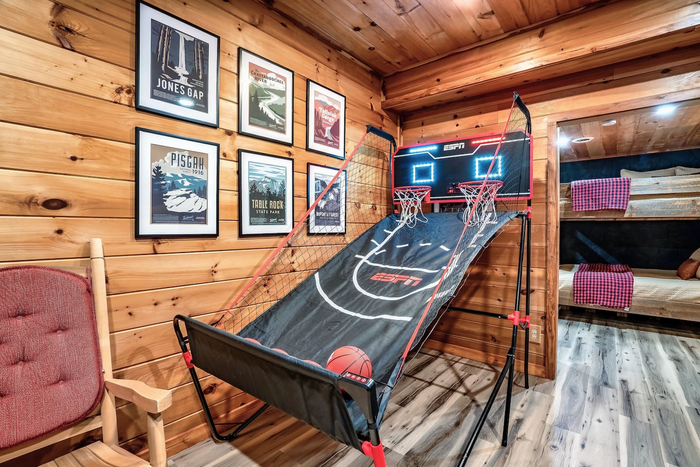 Challenge your friend in this exciting mountain cabin retreat with a basketball shootout in the game room.
