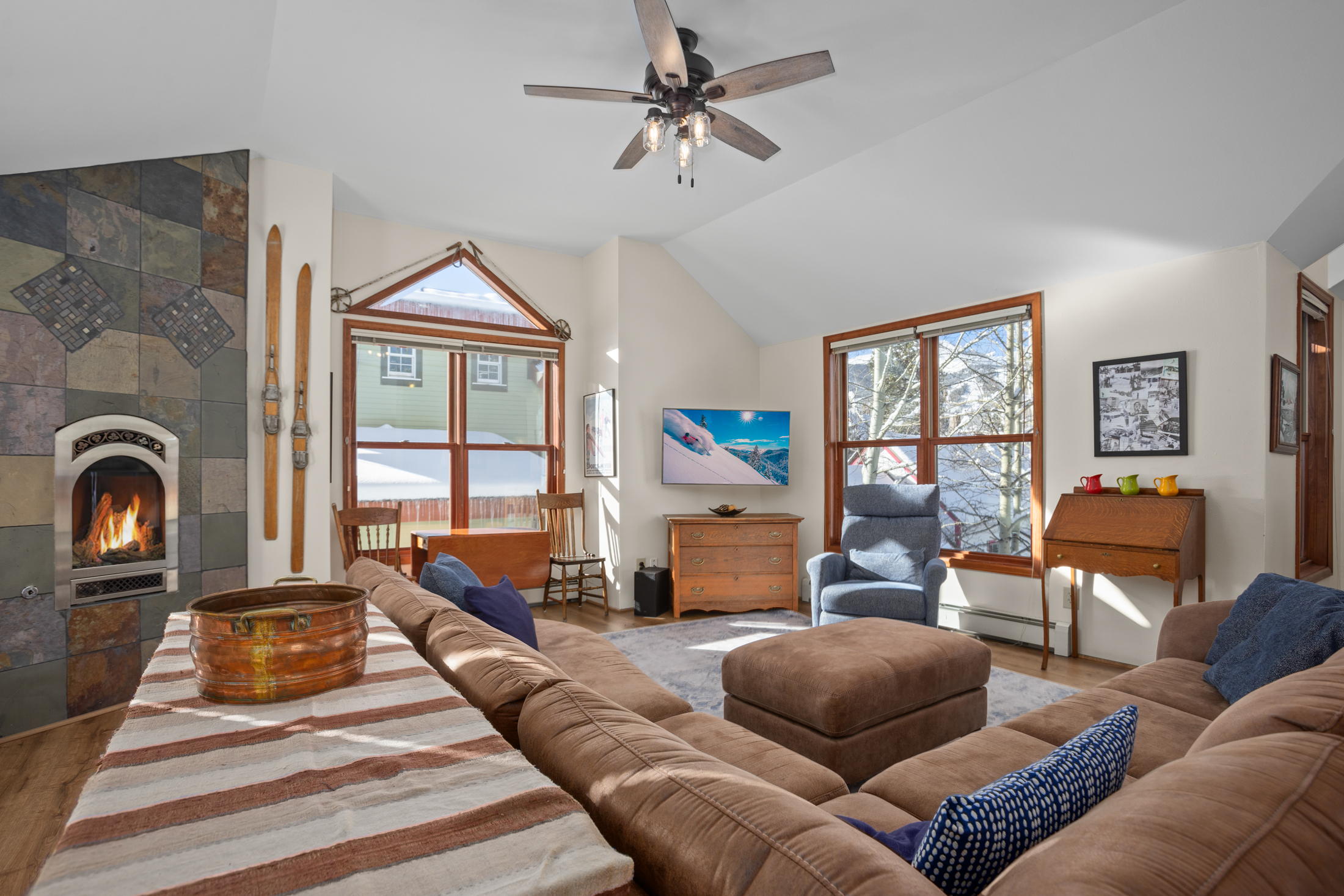 Family Room w/ Gas Fireplace and Ceiling Fan