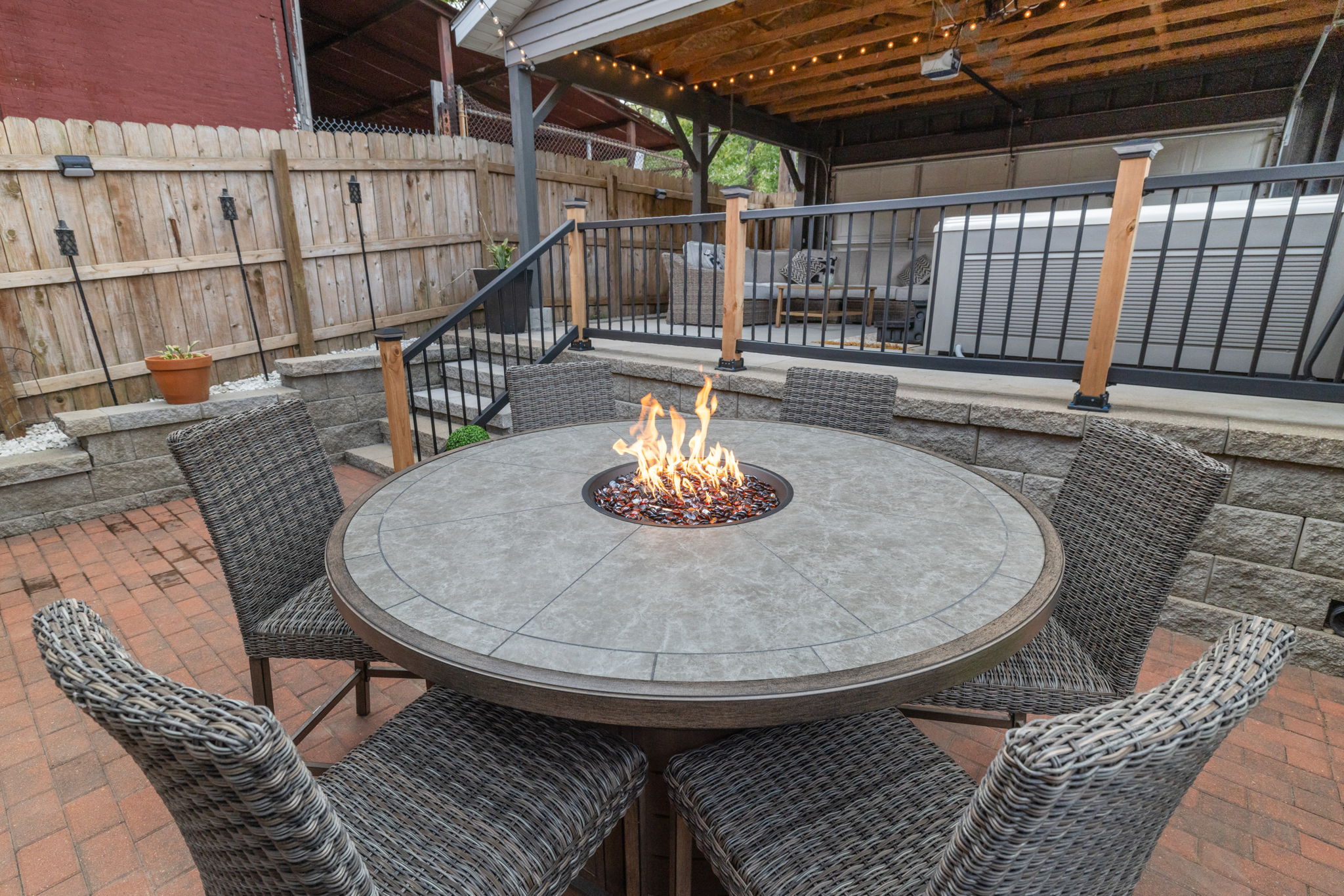 There are plenty of spaces to spread out and enjoy each other's company in the spacious back yard area.