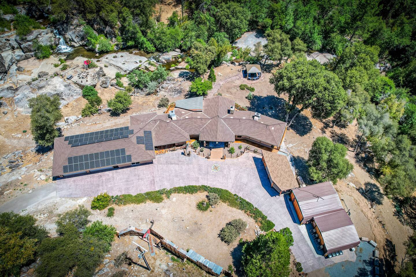 View of the property, solar panels are on the garage which is only partially included in my listing - game room