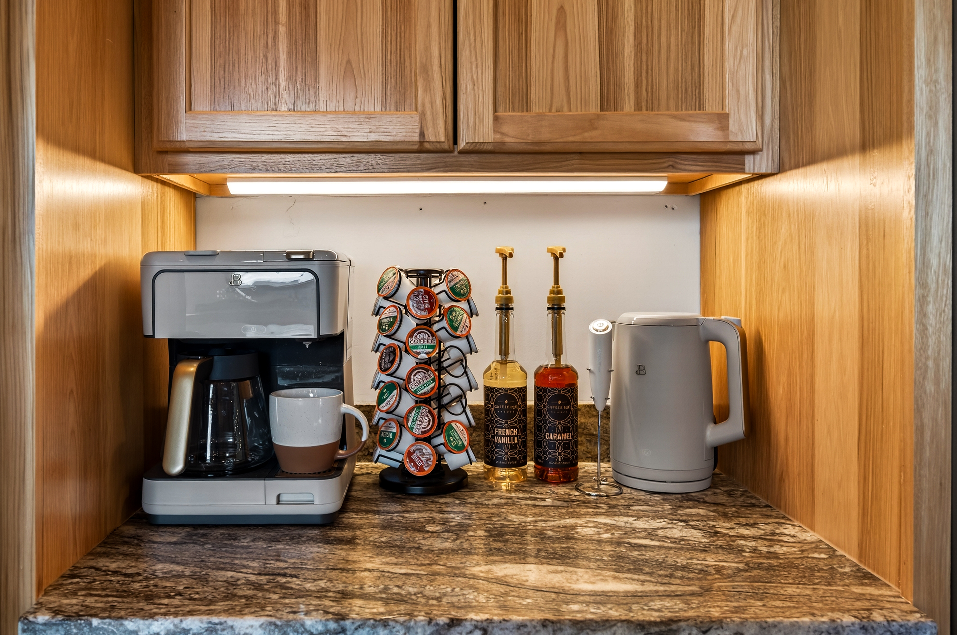 Start your day right with the Coffee Bar - single cup or a pot for the group. Comes with organic coffee pods, real cane sugar flavored syrups and a frother. 