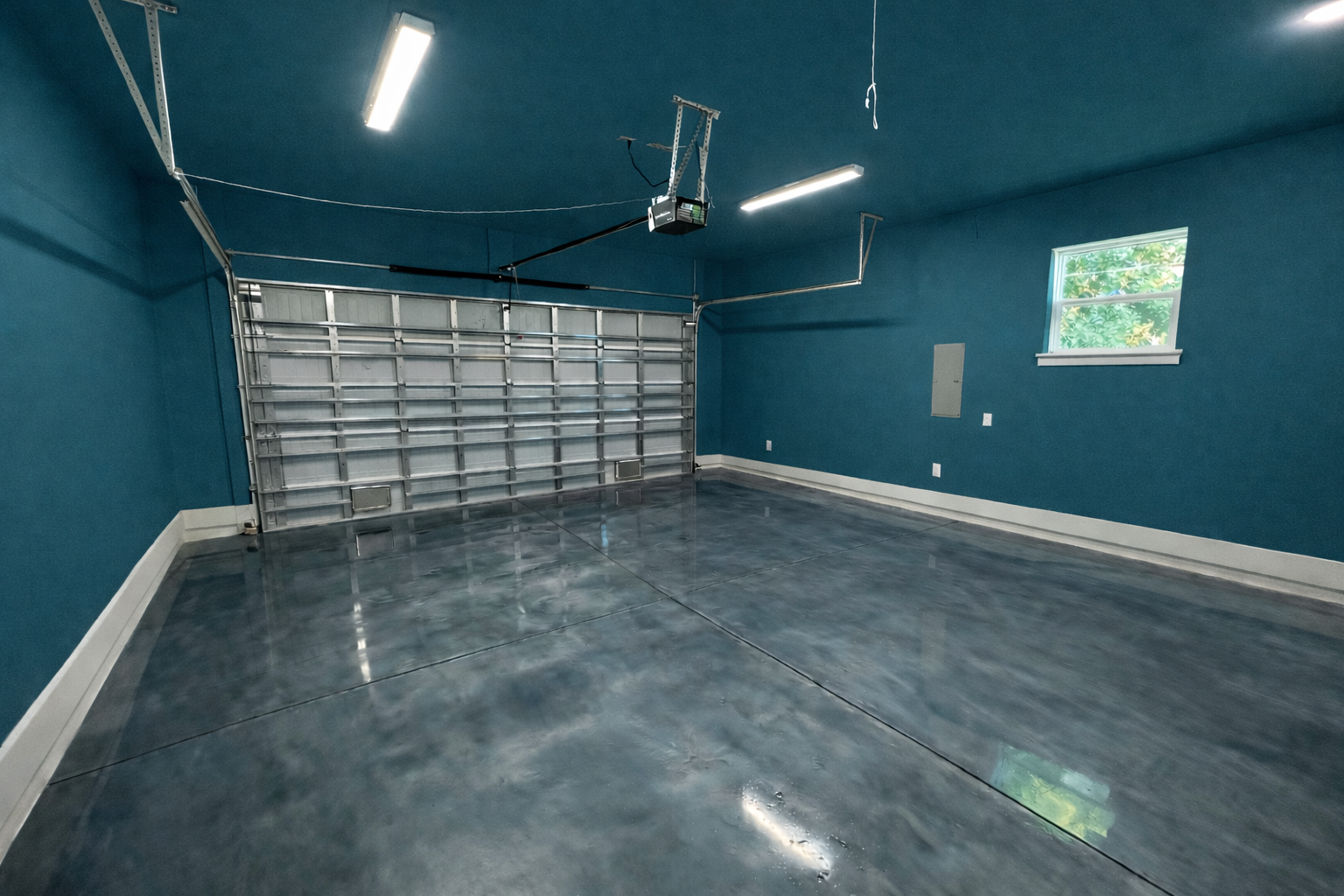Garage that is being transformed into a one of a kind game room and hang-out space.