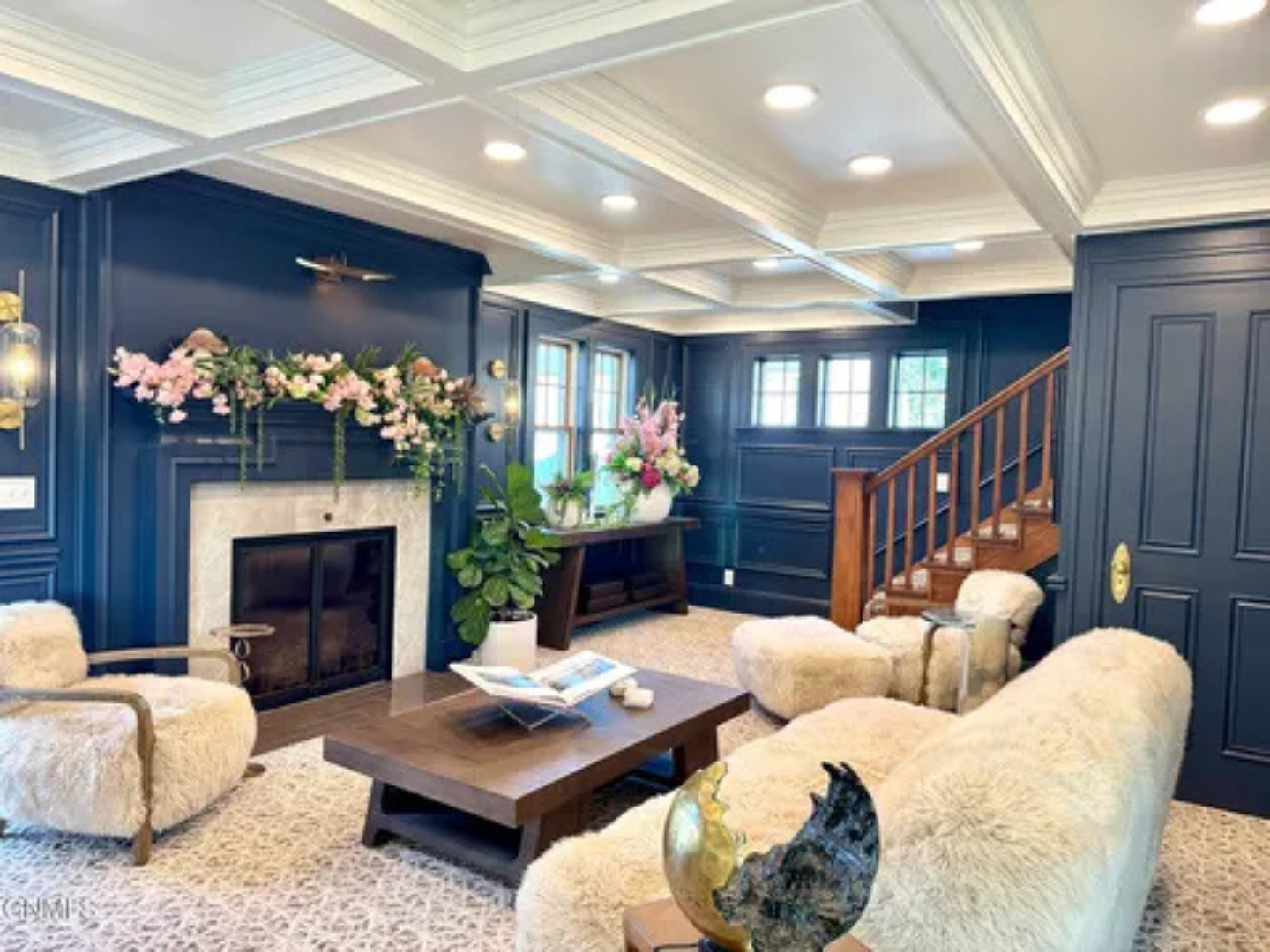 A warm, welcoming space where you can stretch out and enjoy the fireplace.