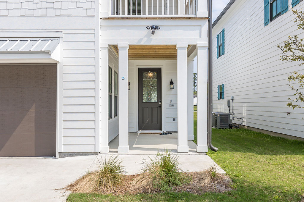 Cool Light Fixtures Outside and Front Door with Glass Panels to Express a Classy Feel