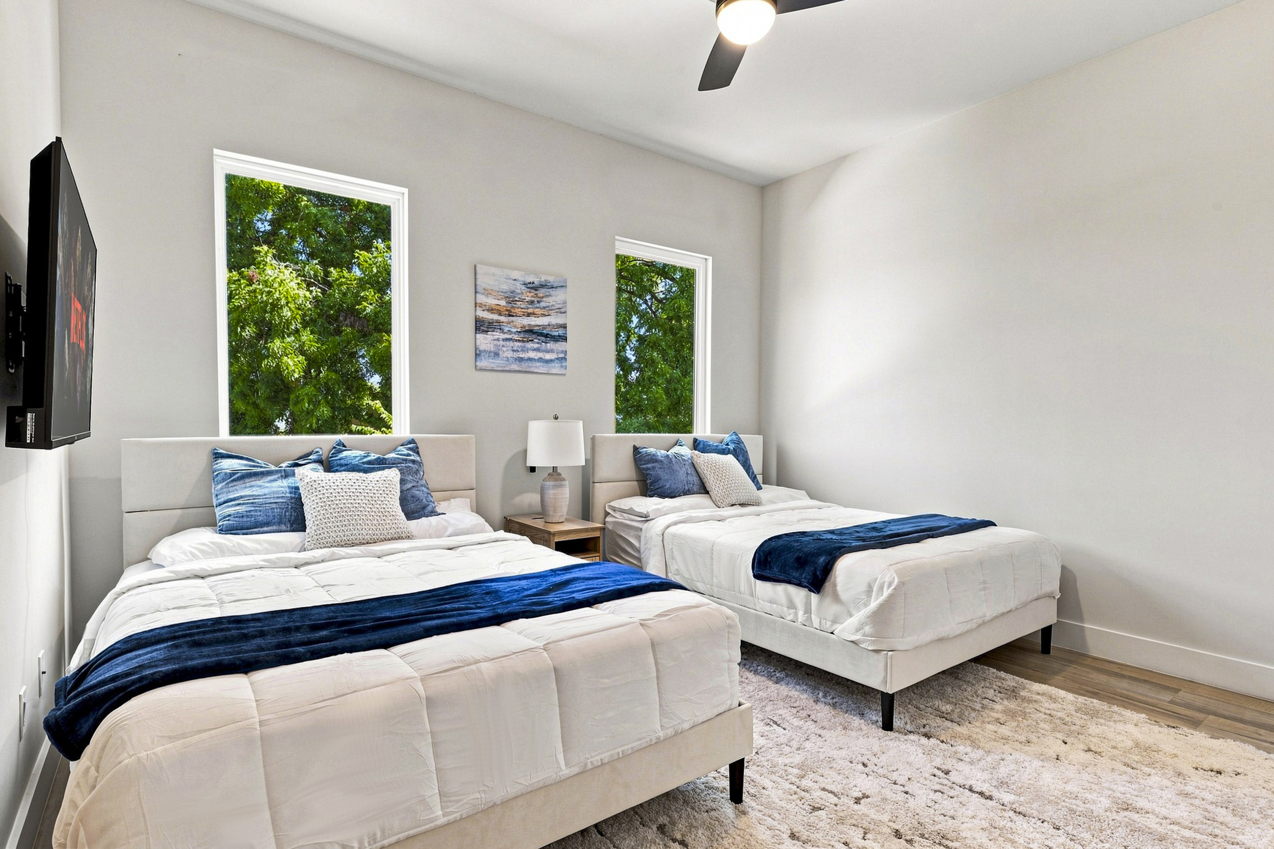 Bright and airy retreat with plush beds and leafy views unwind in style!