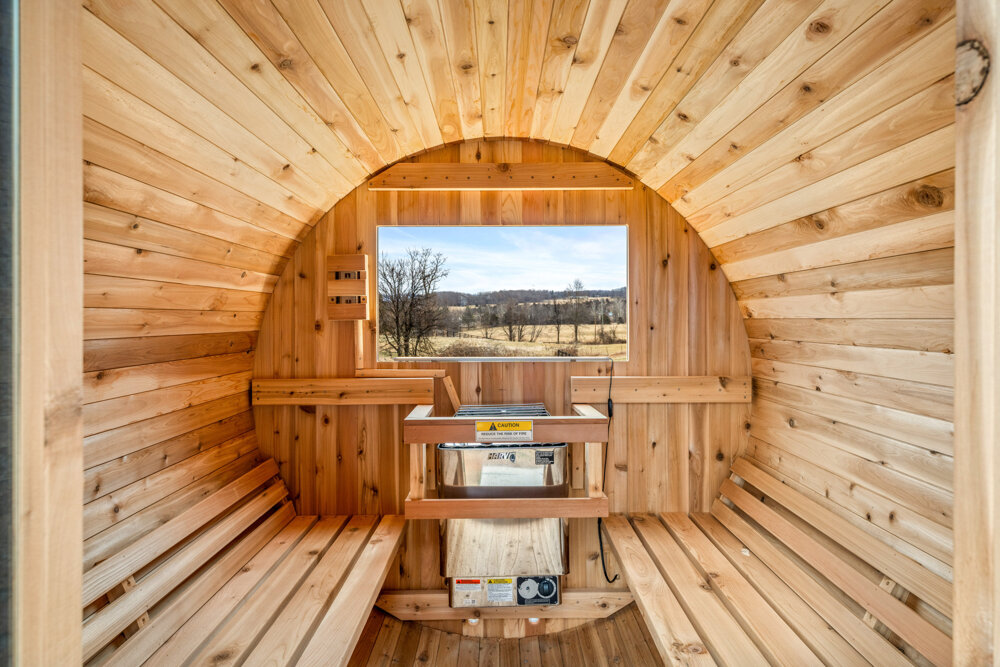 Your private barrel sauna escape. Warm cedar, peaceful views, and a full-body reset after a family day out.