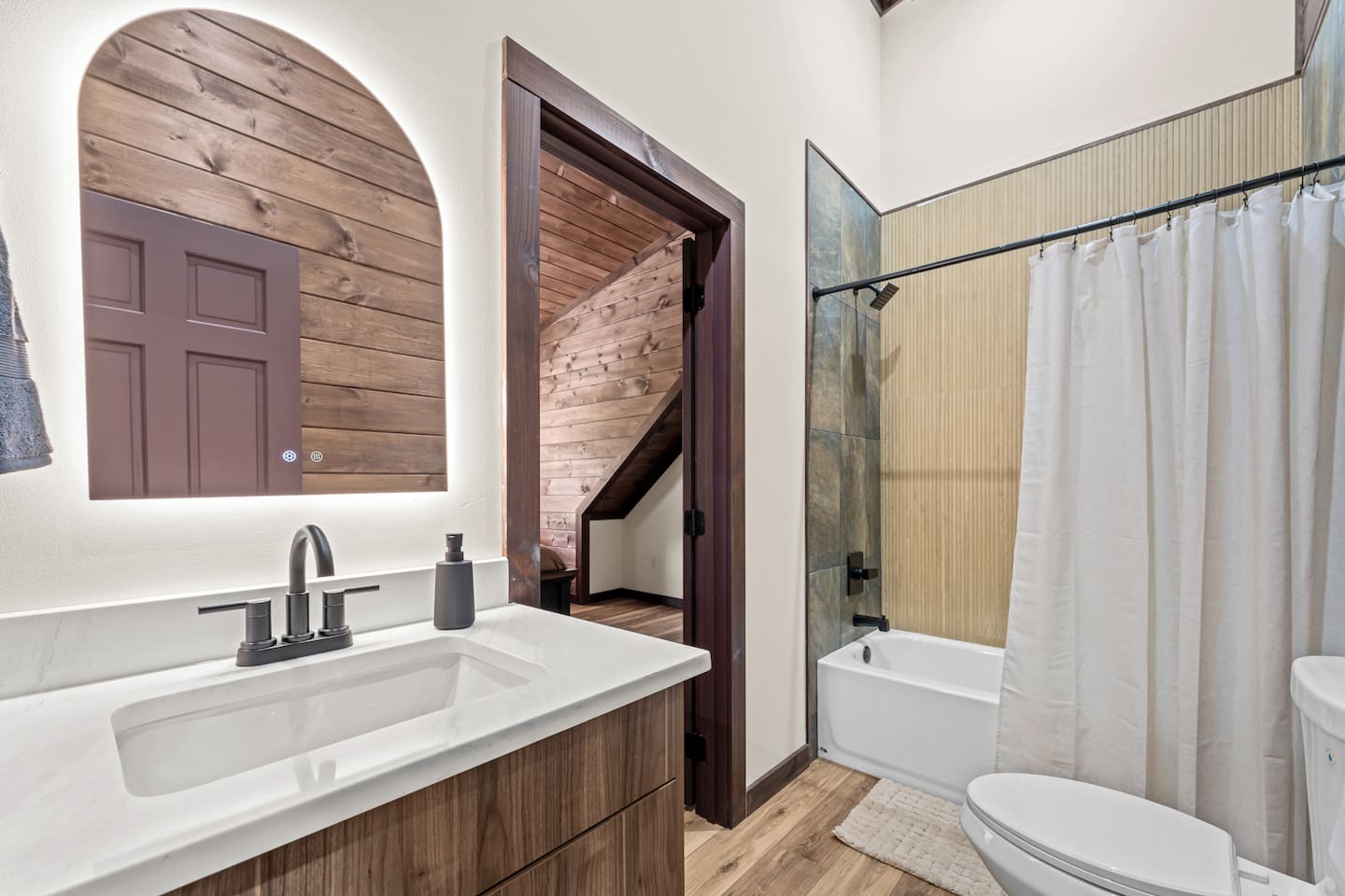upstairs bathroom with tub 