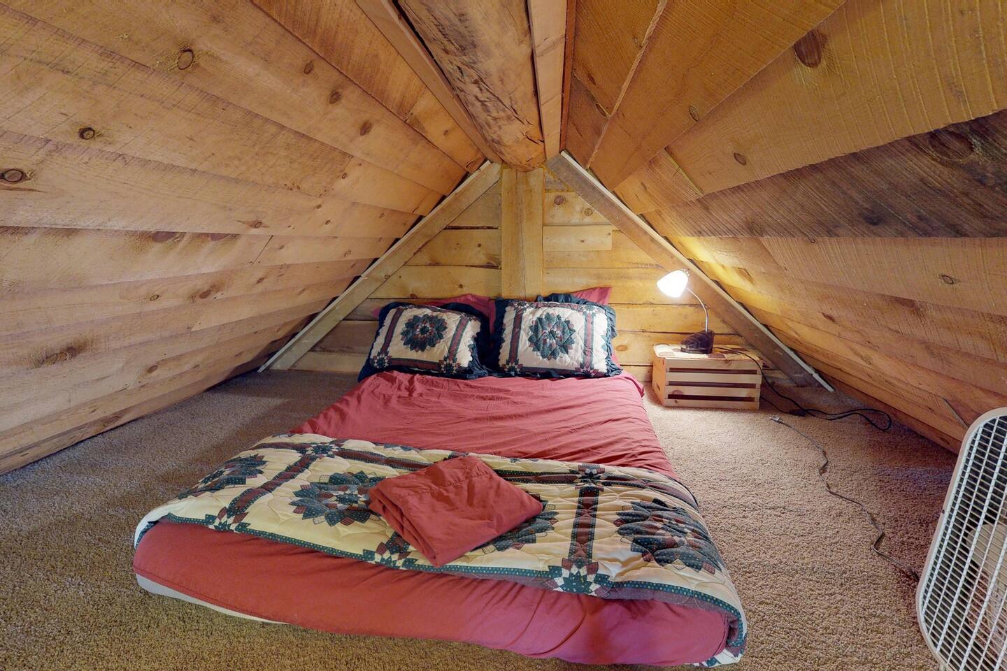 There is a full sized bed in the loft