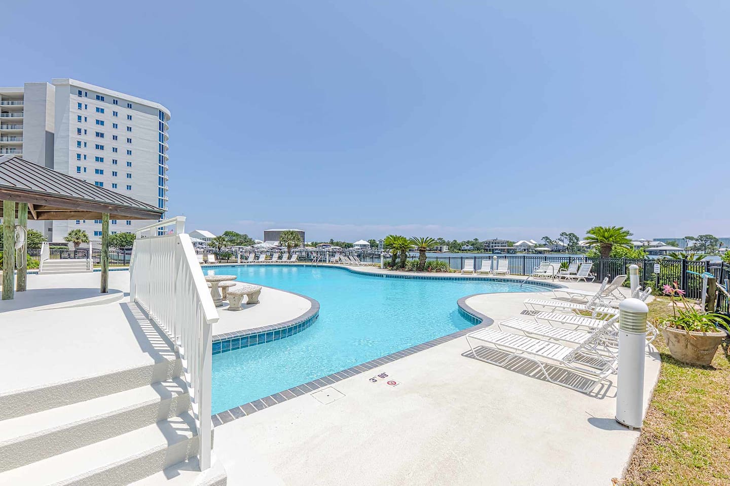 Poolside Paradise: Dive into relaxation with scenic views and inviting lounge areas!