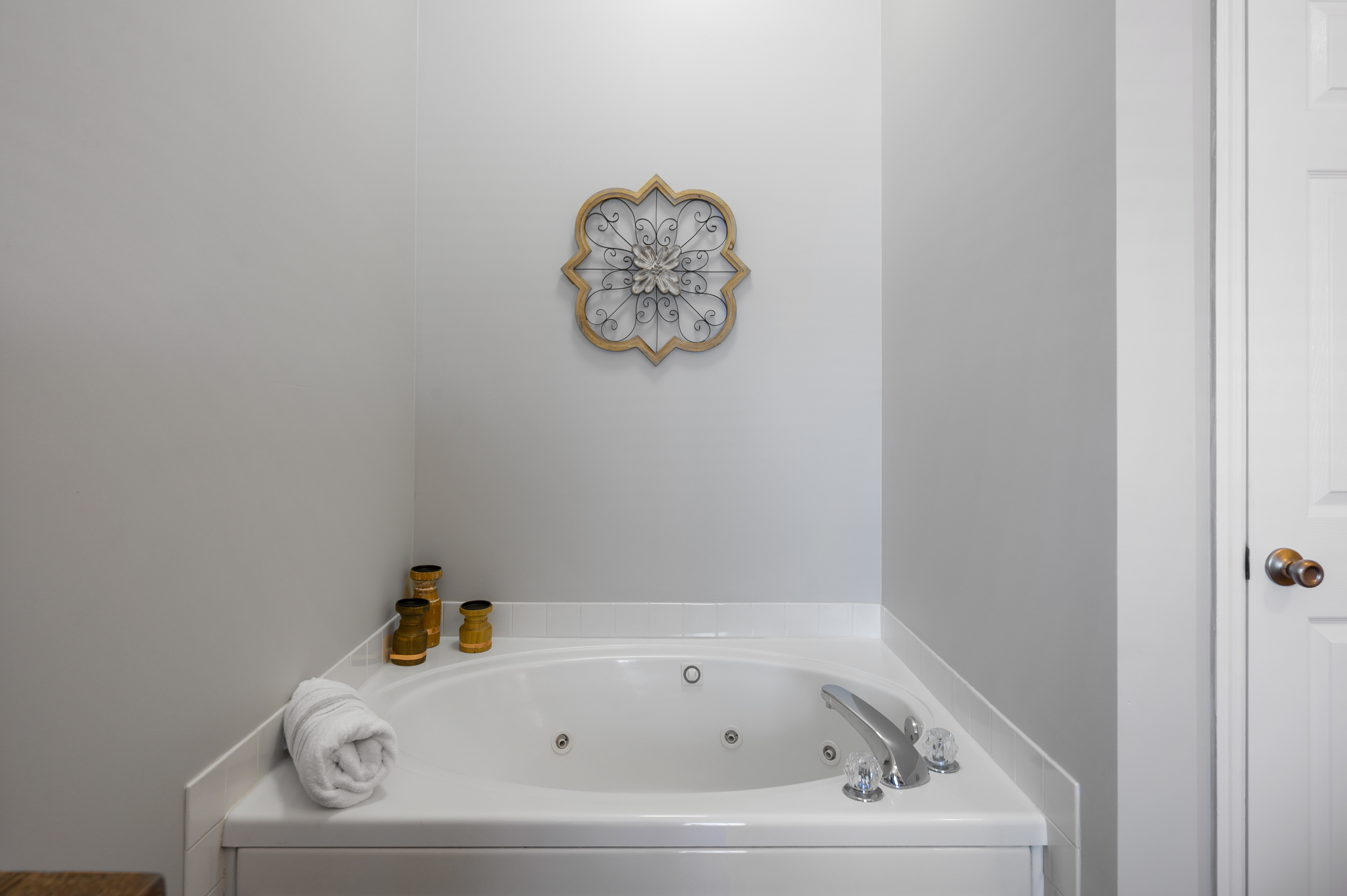 Jetted Jacuzzi tub in bedroom