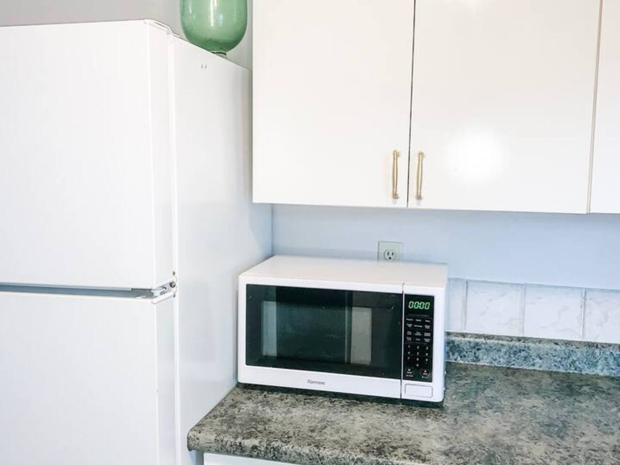 Microwave, Fridge in a full modern Kitchen