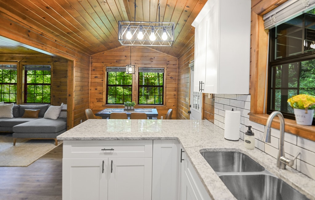 Kitchen w/ granite tops and SS appliances 