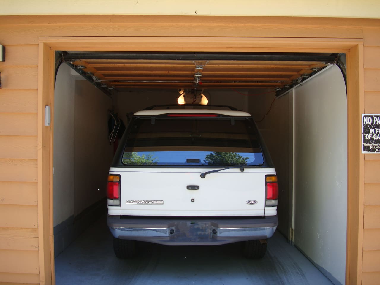 Convenient garage accommodates small and narrow vehicles.