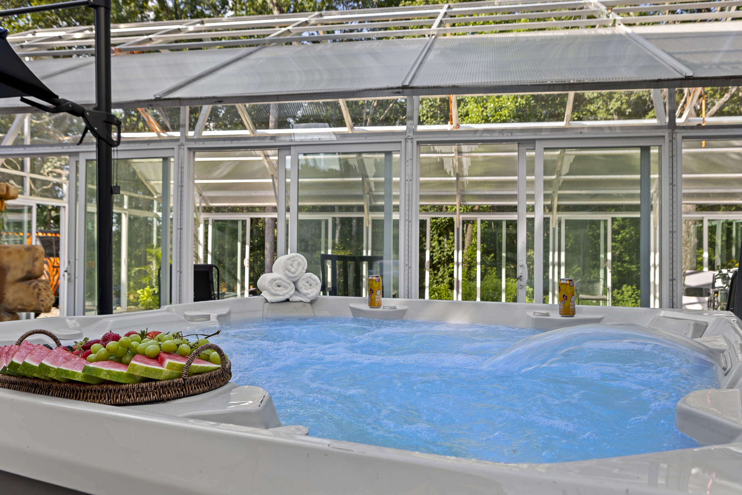 Hot Tub Retreat: Soak in luxury surrounded by nature, with refreshments at your fingertips!