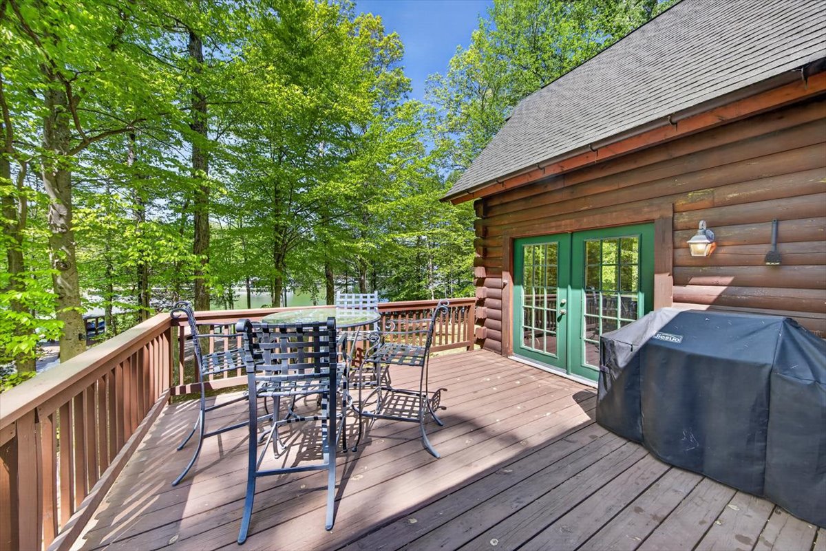 Outdoor grill and dining ready for your lakeside cookouts.