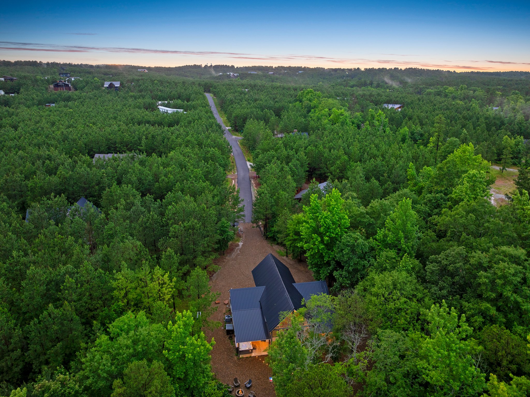The cabin is at the end of the road, in a secluded lot