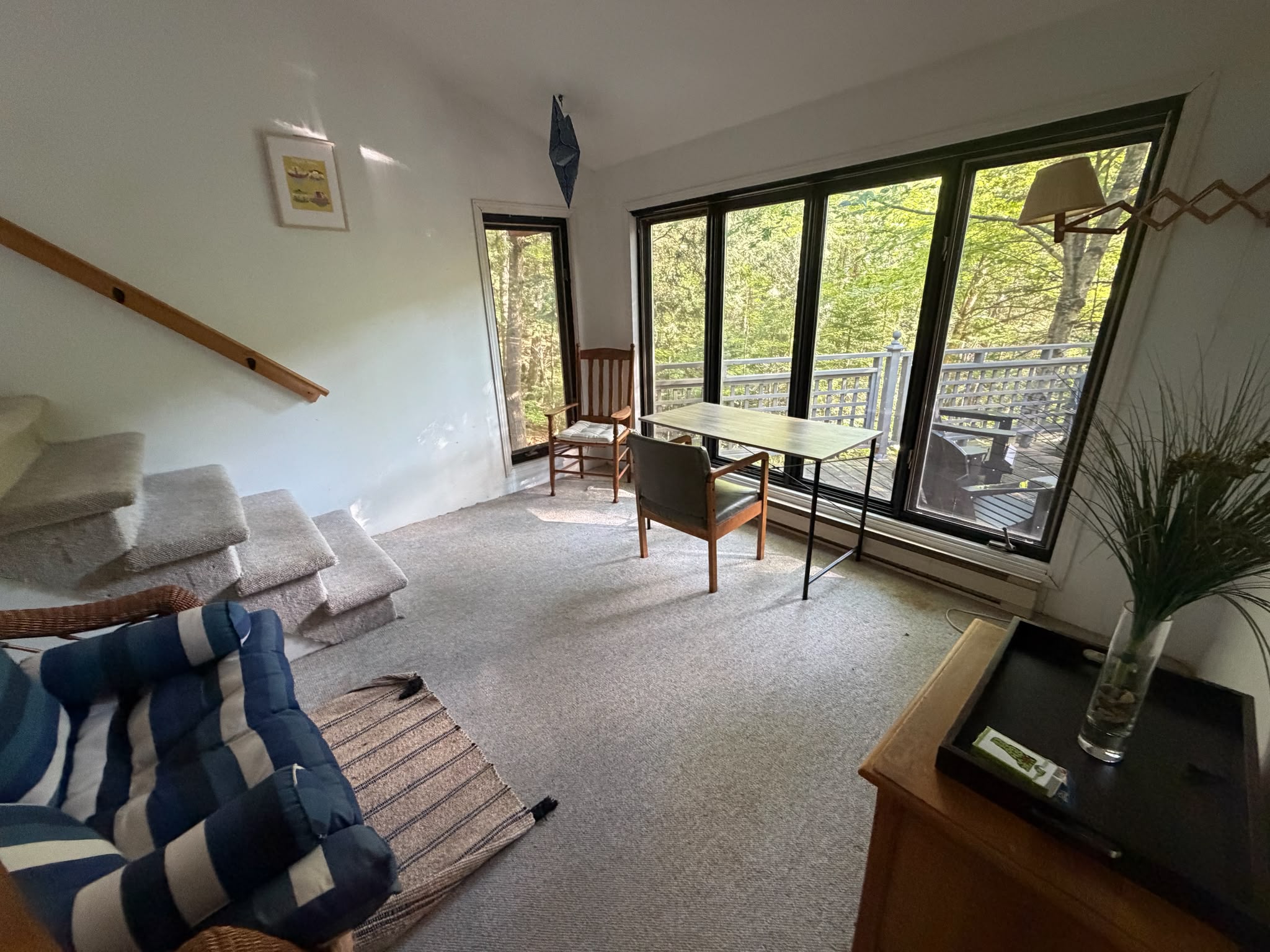 Seating area below for master bedroom suite