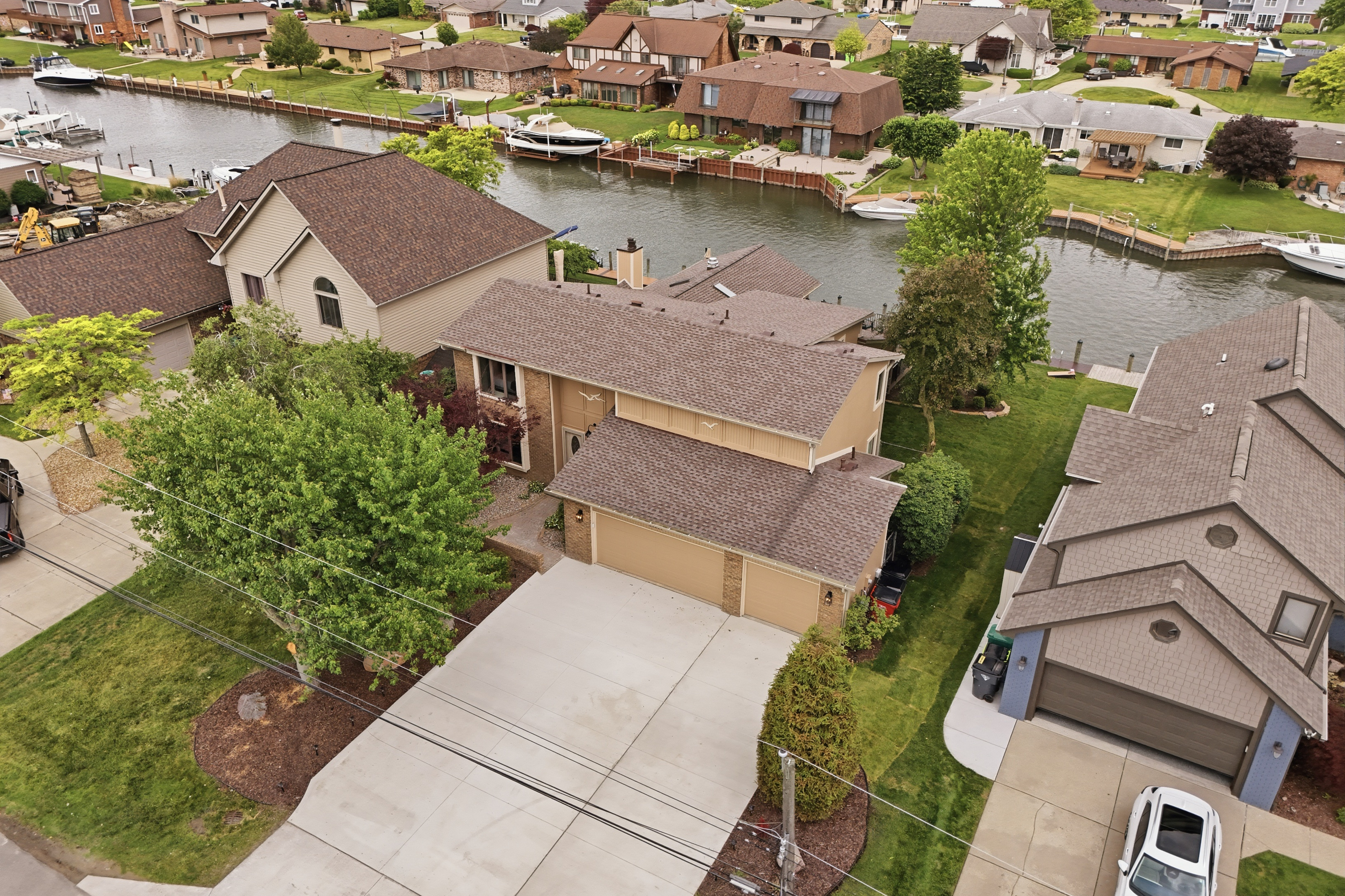 Waterfront home in a quiet canal community with private dock access and well-maintained suburban surroundings.