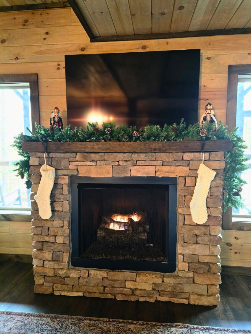 The cabin is decorated for the holidays - main floor living room
