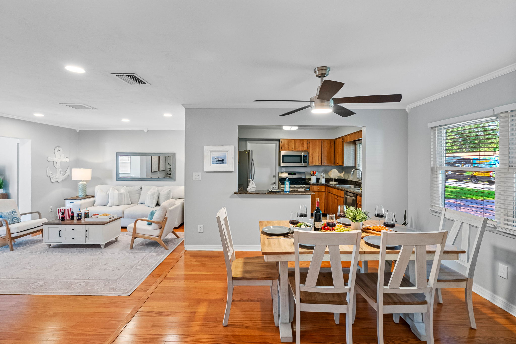 Cozy up to conversation in this light-filled dining area nestled between the living room and kitchen.