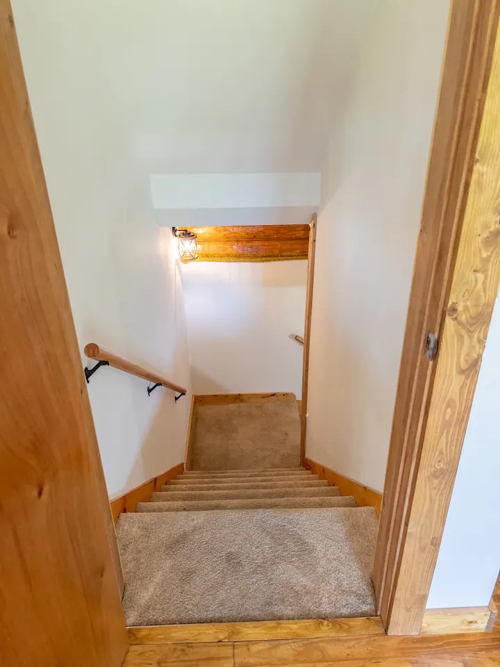 Stairs to downstairs from kitchen
