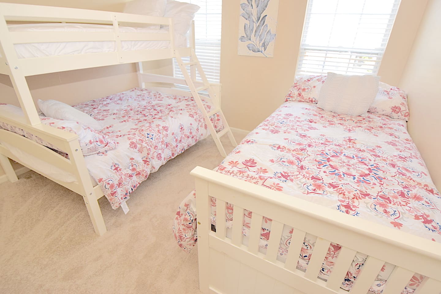 A twin over full bunkbed and a trundle bed that has a rollout bed underneath.  Total of 4 beds in this room.  Perfect for kids or multiple adults.