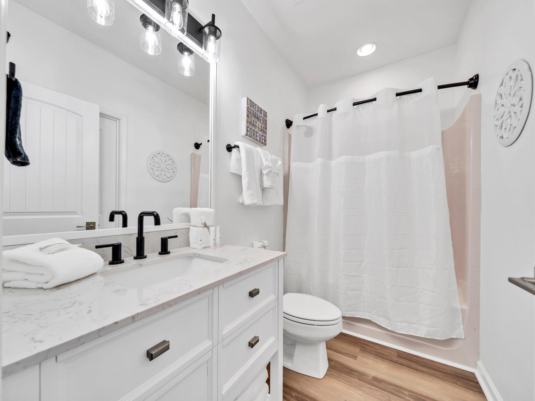 This second-floor bathroom has one of two bathtubs