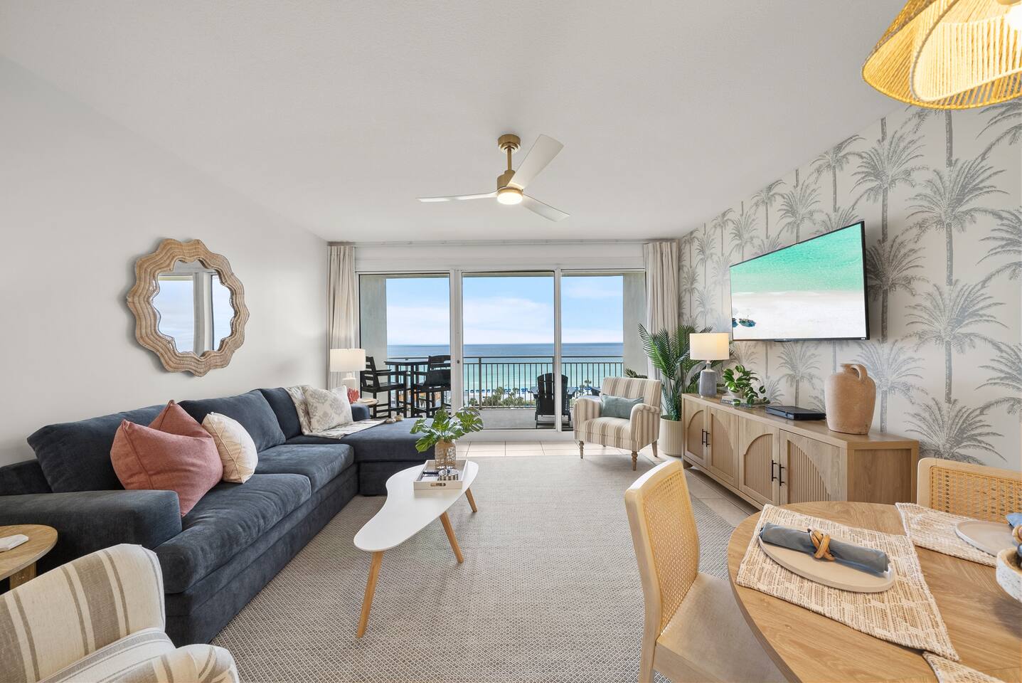 Open living space with kitchen opening up to dining area and living room.
Sofa converts into a Queen bed.  55 inch Smart TV.