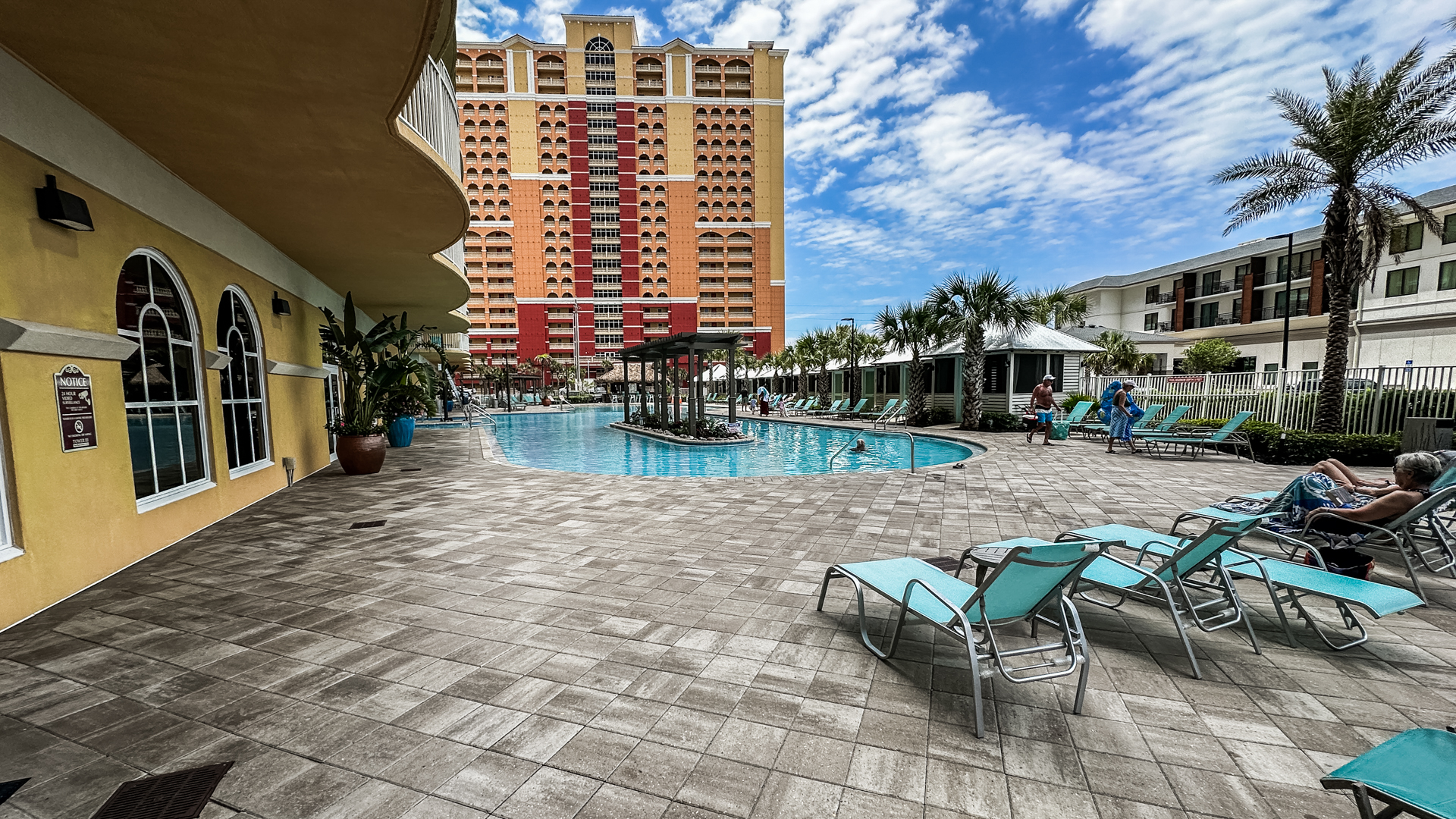 A SUPER LARGE WADE-IN  POOL & RENTABLE CABANAS  ALONG EAST SIDE, GYMON WEST SIDE  SIDE