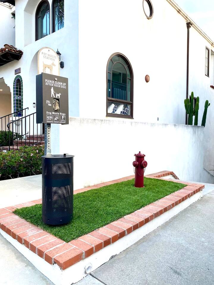 Our condo is pet friendly and even has its own  "Dog Park" designed for dogs to feel like they're on vacation too :)